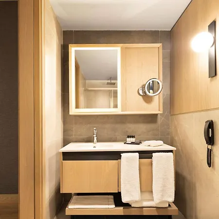 Отель Movenpick Living Camlivadi